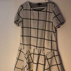 Sleek and professional dropped waist dress